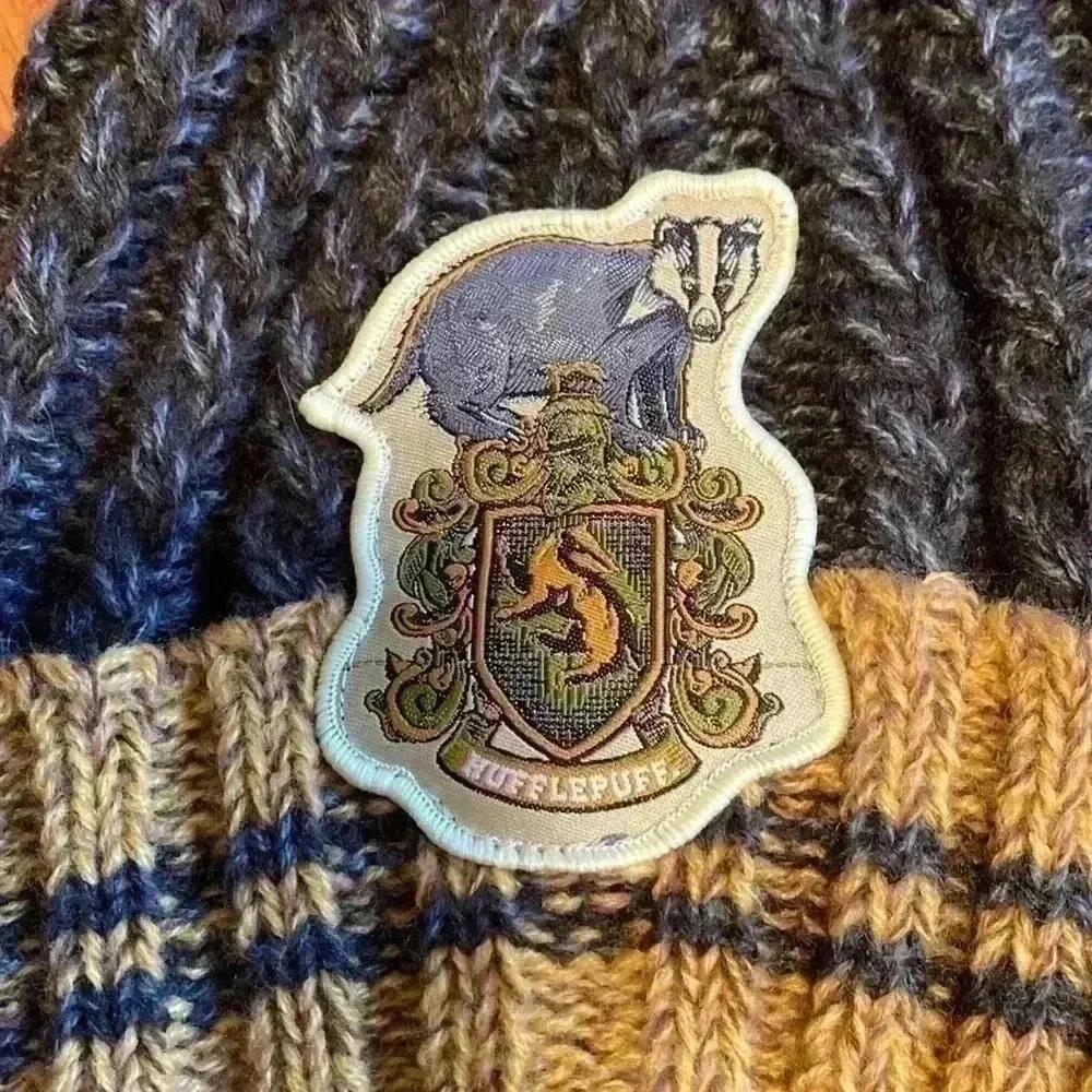 Harry Potter Hufflepuff Knit Beanie With PomPom in Size Youth.  Gray and Yellow.